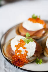 Blinis with sour cream, smoked salmon and fish roe - SBDF04143