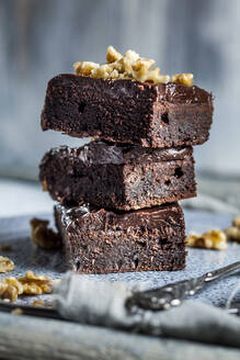 Stack of homemade gluten free brownies with chocolate and coffee glazing - SBDF04164