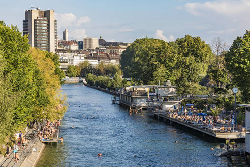 Switzerland, Canton of Zurich, Zurich, People relaxing along Limmat river - WDF05610