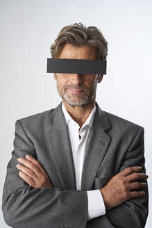 Portrait of mature man with censorship bar - PHDF00015