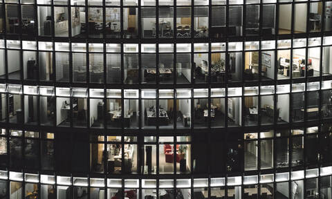 Modern office building at night, Potsdamer Platz, Berlin, Germany stock photo