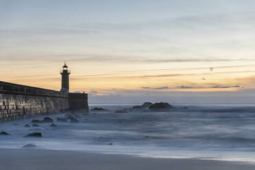 Portugal, Porto District, Porto, Long exposure of Felgueiras Lighthouse at dusk - WPEF02400