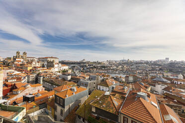 Portugal, Porto District, Porto, Clouds over roofs of city buildings seen from Miradouro da Vitoria - WPEF02404