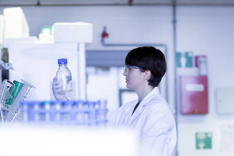 Female laboratory technician working in a laboratory stock photo