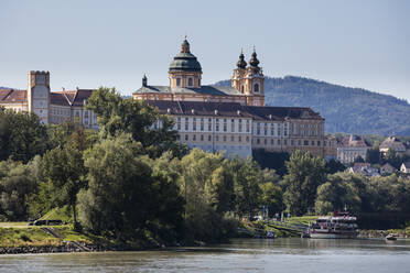 Austria, Lower Austria, Melk, Green trees between Danube river and Melk Abbey - WIF04106