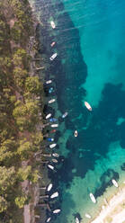 Aerial view of boats anchored at transparent water bay, Mali Lošinj, Croatia. - AAEF05923