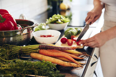 Woman preparing healthy food in kitchen - JOHF04694