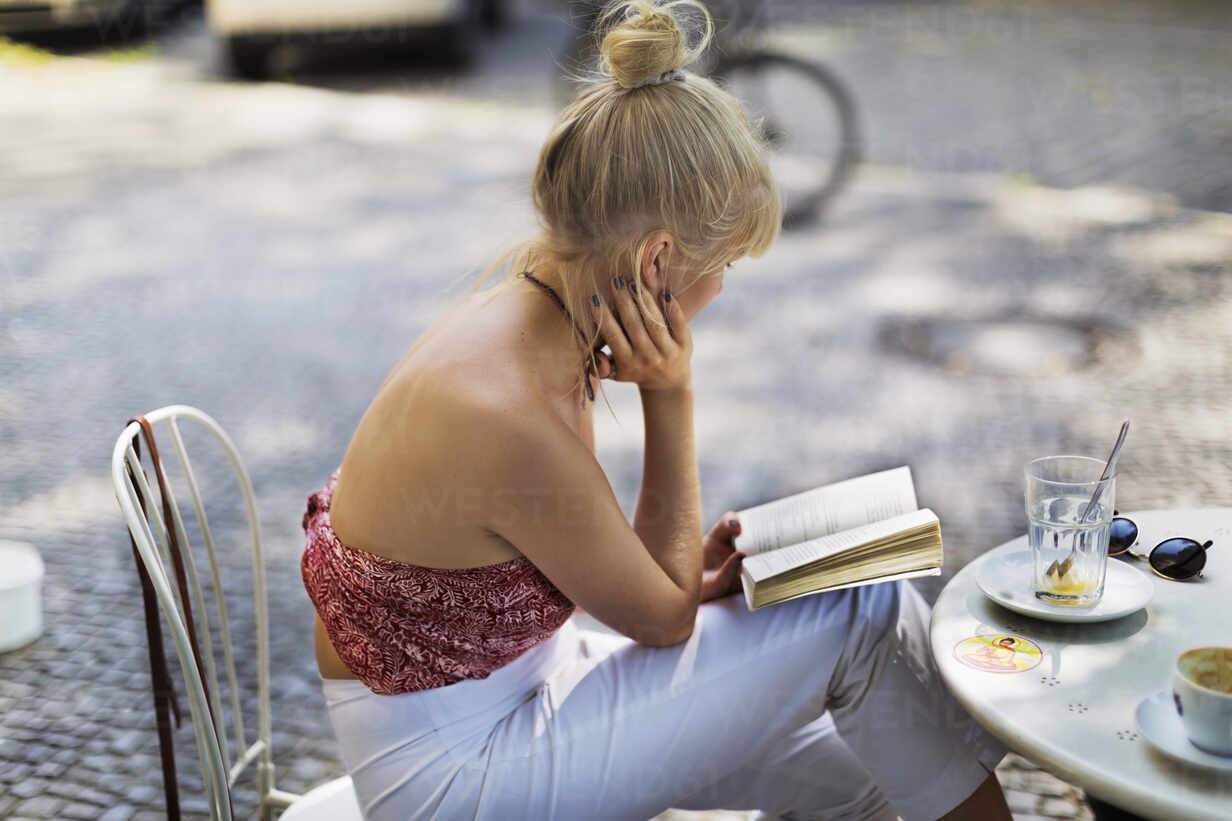 Read Book With Coffee Cup Beside Jetty Stock Photo, Picture and