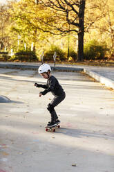 Boy skateboarding - JOHF04785