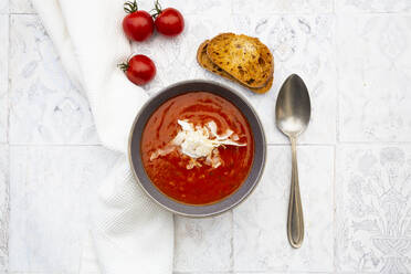 Bowl of vegan tomato soup with coconut flakes - LVF08463