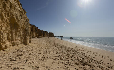 Beach against the sun, Praja da Rocha, Algarve, Portugal stock photo