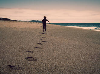 Boy Running on the Beach - CAVF70127