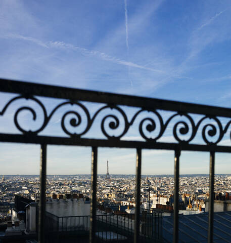 France, Ile-de-France, Paris, Metal railing against sky and city downtown stock photo