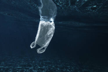 Plastic bag floating in sea - CUF53652