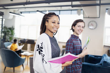 Portrait confident businesswomen in office - HOXF04797