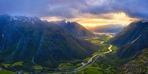 Aerial view of clouds at sunset over Romsdalen valley from Romsdalseggen ridge, Andalsnes, More og Romsdal county, Norway, Scandinavia, Europe - RHPLF13083