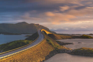 Sunset over Storseisundet Bridge, Atlantic Road, More og Romsdal county, Norway, Scandinavia, Europe - RHPLF13289