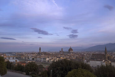 Distance view of Palazzo Vecchio and Duomo Santa Maria Del Fiore in city against sky - CAVF70621
