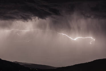 Lightning bolts during thunderstorm over Okanagan Valley, British Columbia, Canada - CUF54140