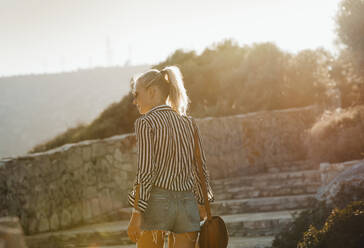 Woman traveller exploring island, Garraf, Spain - CUF54148