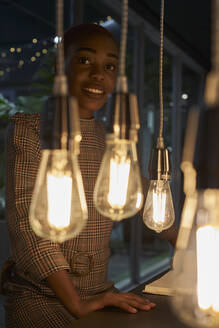 Young woman with short hair behind the lights - VEGF01123