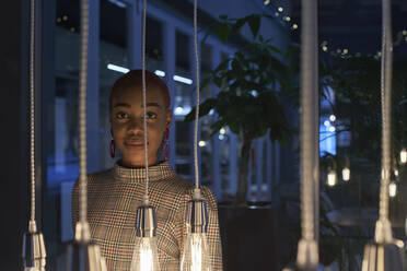 Young woman with short hair behind the lights - VEGF01126