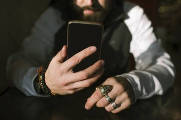 Man's hands with smartphone - EYAF00780