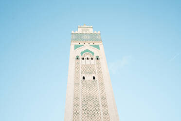 Low angle view of Mosque Hassan II against sky - CAVF70774