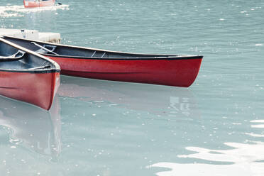 Canoe moored in lake - CAVF71010