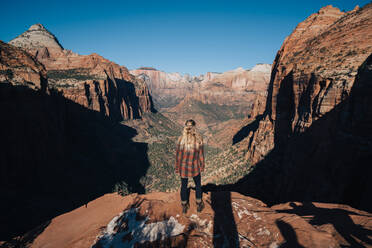 Girl over watching the scenic landscape of Zion National Park - CAVF71357