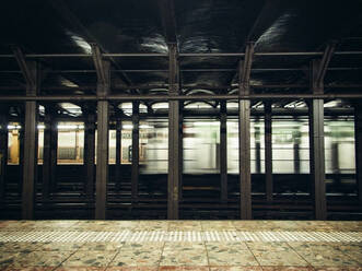 Interior view of subway moving through station in NYC - CAVF71693