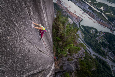 Rock climber on rock face of Heatwave, The Chief, Squamish, Canada - ISF23479