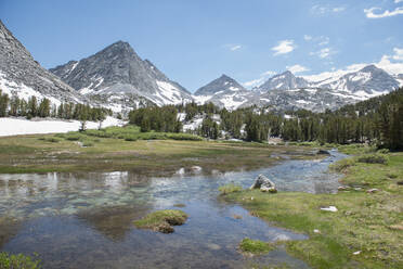 Scenic view of mountain ranges against sky - CAVF72295