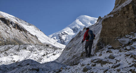 Mountaineer at Chonbarden Glacier, Dhaulagiri Circuit Trek, Himalaya, Nepal - ALRF01646