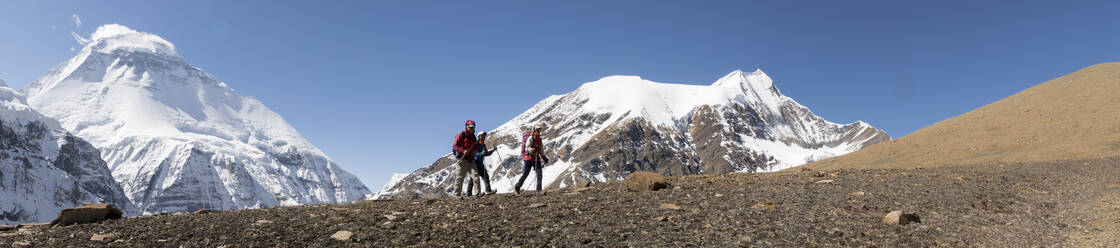 Hikers at Chonbarden Glacier, Dhaulagiri, French Pass, Dhaulagiri Circuit Trek, Himalaya, Nepal - ALRF01662