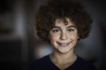 Portrait of smiling boy with brown ringlets - FMKF06056