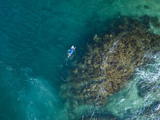 Aerial view of surfer, Sumbawa, Indonesia - KNTF03870