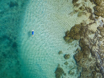 Aerial view of surfer, Sumbawa, Indonesia - KNTF03872