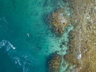 Aerial view of surfer, Sumbawa, Indonesia - KNTF03875