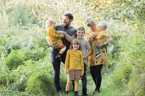 Portrait of happy family in nature - NMSF00383