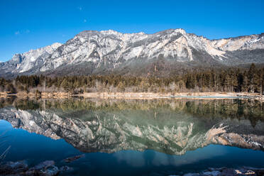 Austria, Carinthia, Villach Hausberg and Gail river in winter - DAWF00999