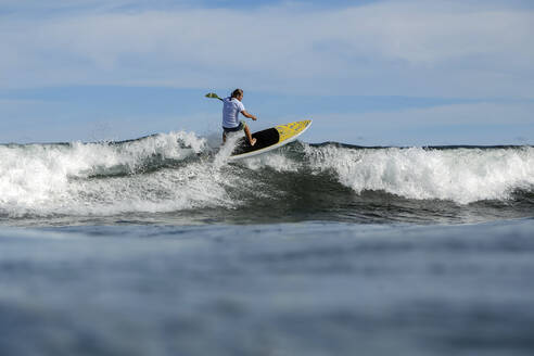 SUP surfer, Bali, Indonesia - KNTF03883