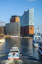 Germany, Hamburg, Ferry sailing toward Elbphilharmonie - PUF01778