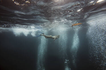 Woman underwater, Gili Meno, Gili islands, Bali, Indonesia - KNTF03928