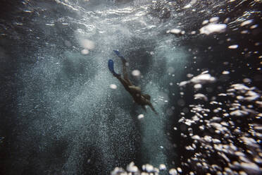 Woman underwater, Gili Meno, Gili islands, Bali, Indonesia - KNTF03932