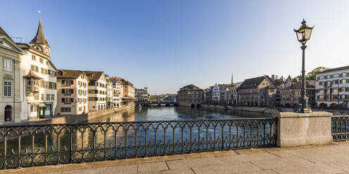 Switzerland, Canton of Zurich, Zurich, View from Munsterbrucke on Limmat river and surrounding old town buildings - WDF05628