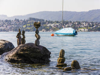 Switzerland, Canton of Zurich, Zurich, Rock stacks on shore of Lake Zurich - WDF05634