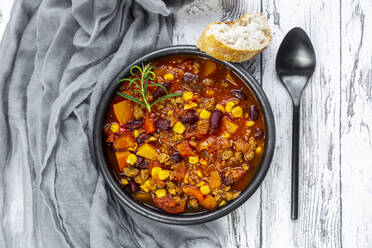 Overhead view of bowl of vegetarian chili con carne - SARF04413