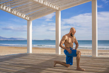 Sportsman training at the beach - DLTSF00372