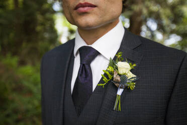 Midsection of bridegroom in full suit - CAVF72529